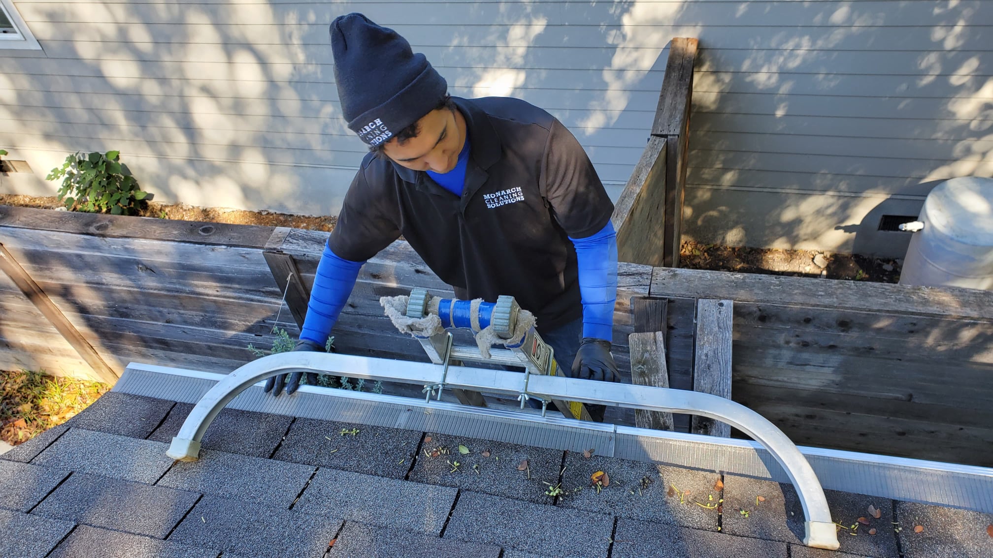 Monarch crew installing gutter guards